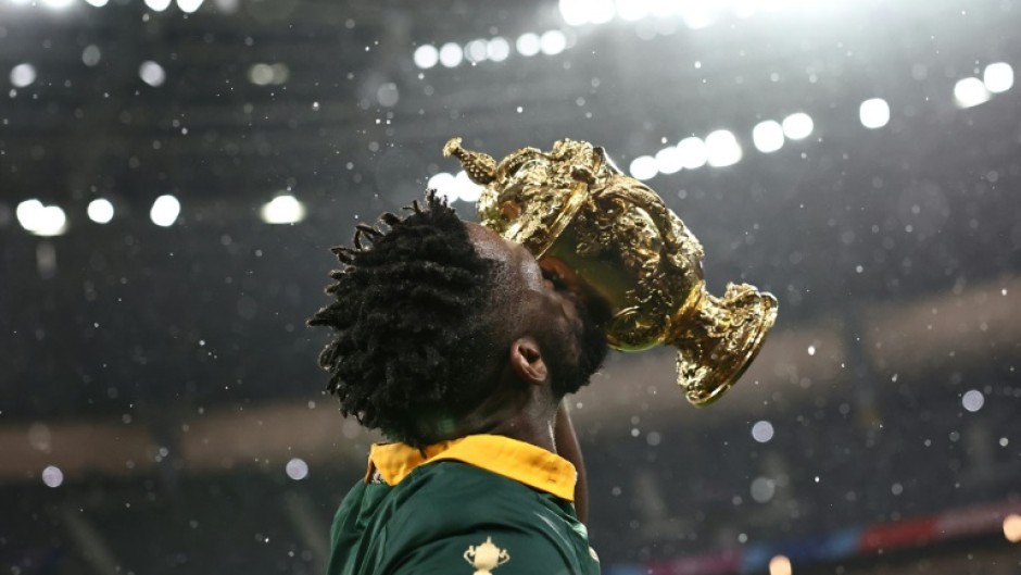 South Africa captain Siya Kolisi kisses the Webb Ellis Cup after victory over New Zealand in the 2023 Rugby World Cup final in Paris.