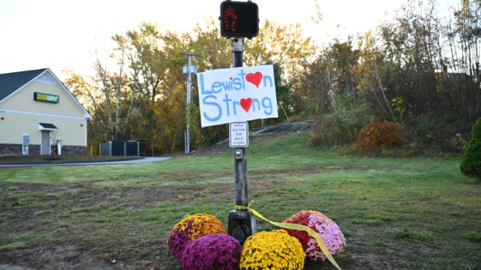 A sign reading "Lewiston Strong" is seen in Lewiston, Maine, after a mass shooting at a bowling alley and bar left 18 people dead