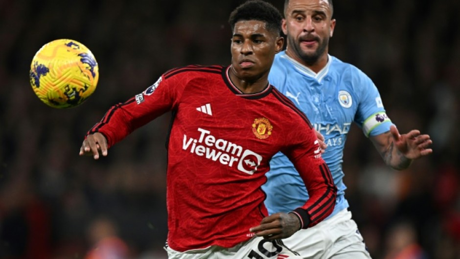 Marcus Rashford (left) has apologised for attending a nightclub hours after Manchester United's 3-0 defeat by Manchester City last weekend