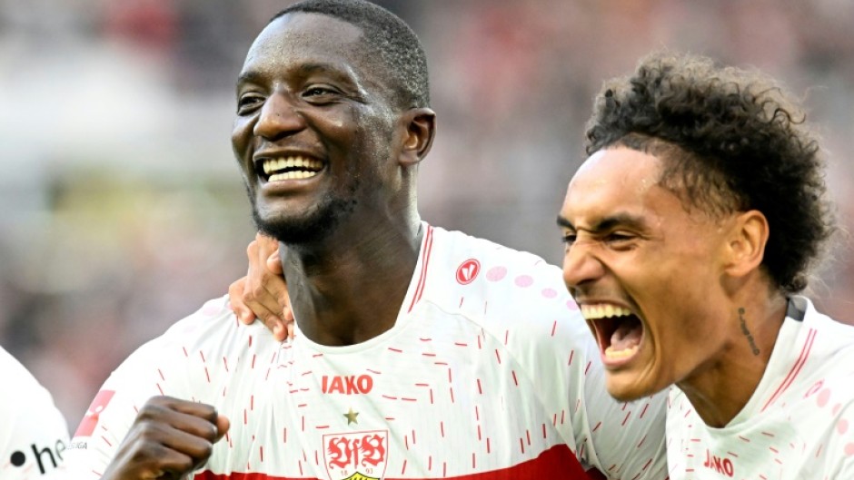  Stuttgart's Serhou Guirassy (left) has scored 14 goals in his opening eight league games -- a Bundesliga record
