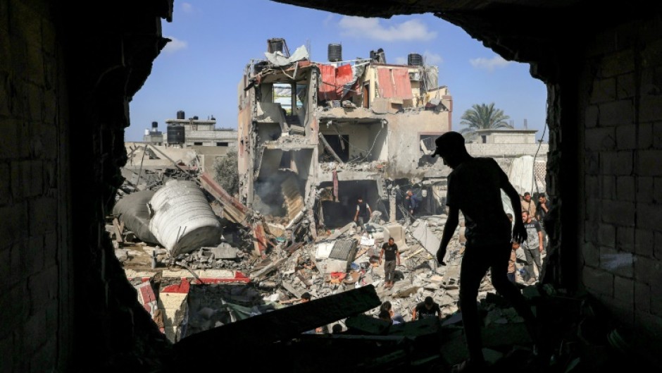 Buildings destroyed during Israeli bombardment in Khan Yunis, southern Gaza, on November 8, 2023