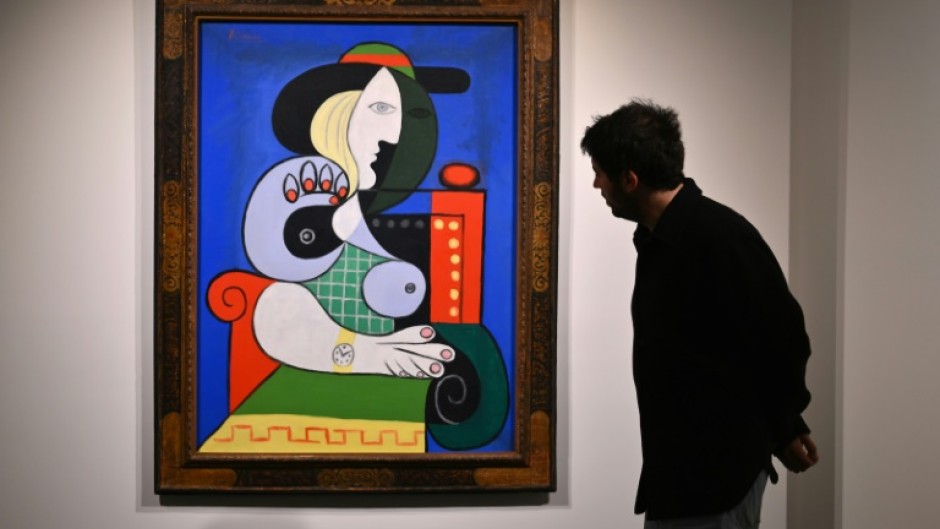 Pablo Picasso's painting 'Femme a la montre,' or 'Woman with a Watch' is viewed during Sotheby’s fall preview in New York on November 2, 2023 