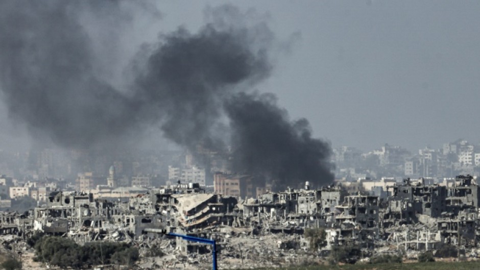 This picture taken from the Israeli side of the border with the Gaza Strip, shows Israeli bombardment of the northern Gaza Strip 