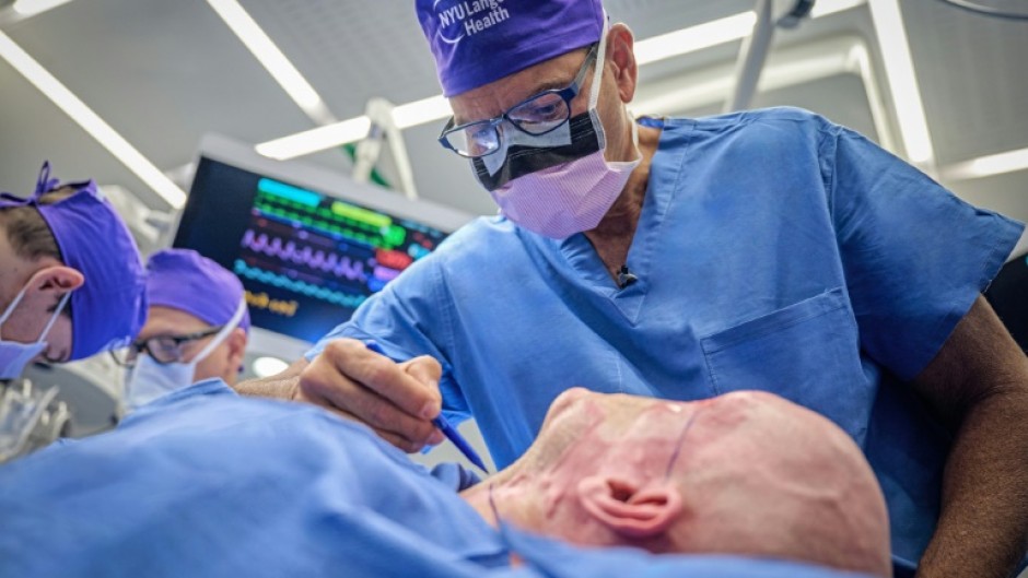 Dr. Eduardo Rodriguez operates on Aaron James in the first whole-eye and partial face transplant, at NYU Langone Health in New York