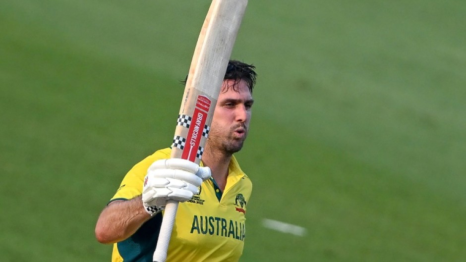 Ton-up: Australia's Mitchell Marsh celebrates his century against Bangladesh