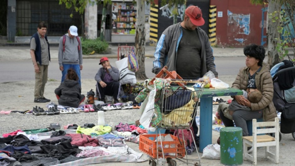 In and around the bustling Argentine capital, it is an increasingly common sight for people to knock on doors asking for second-hand clothes to wear, barter or sell