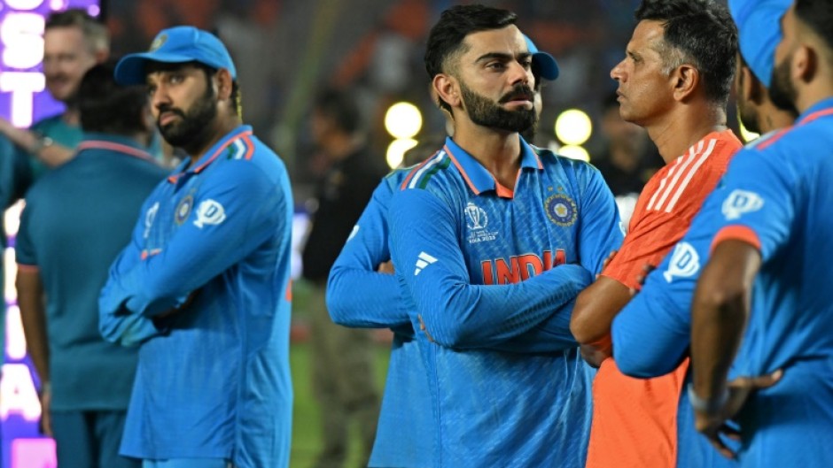 'Gives so much': India coach Rahul Dravid (in orange) stands with his players at the end of the game