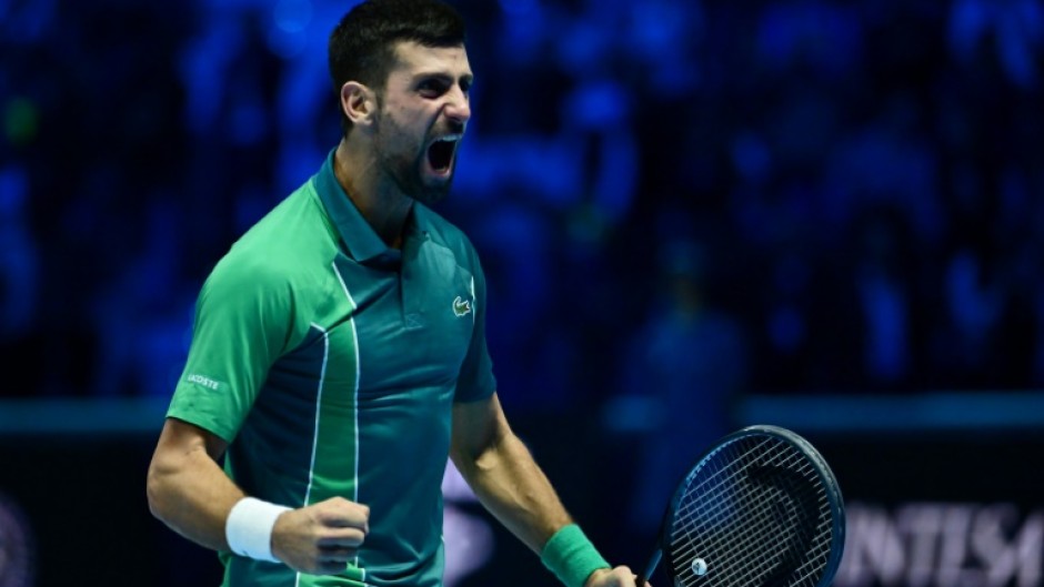 Djokovic celebrates winning a record-breaking seventh ATP Finals title