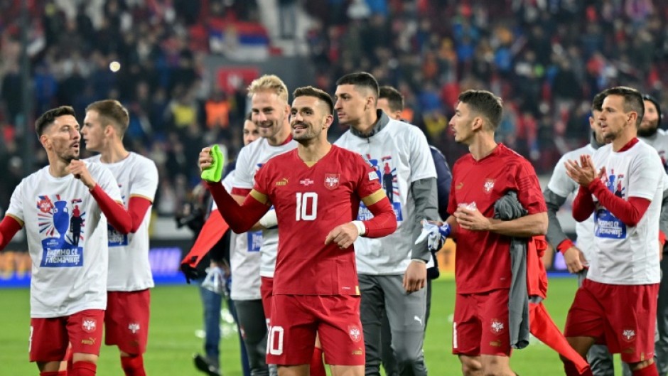 Serbia's players celebrate reaching the European Championship for the first time