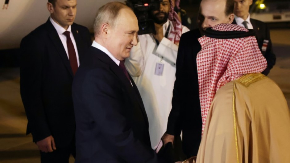 Russia's President Vladimir Putin is welcomed upon arrival in Riyadh