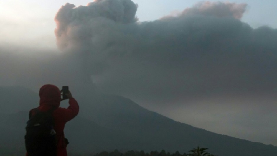Mount Marapi on the island of Sumatra spewed an ash tower 3,000 metres into the sky on Sunday as scores hiked in the area