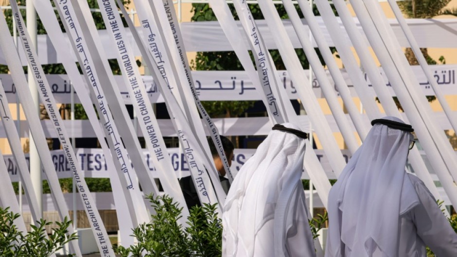 Climate negotiators are scrambling to reach a compromise over the future of fossil fuels 