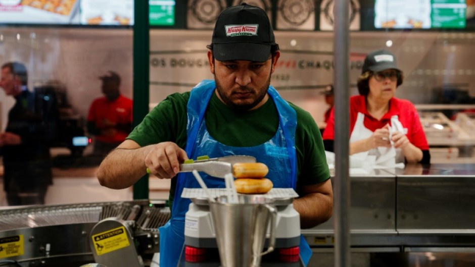 Krispy Kreme has opened its first shop in Paris and is aiming for 500 nationwide within five years