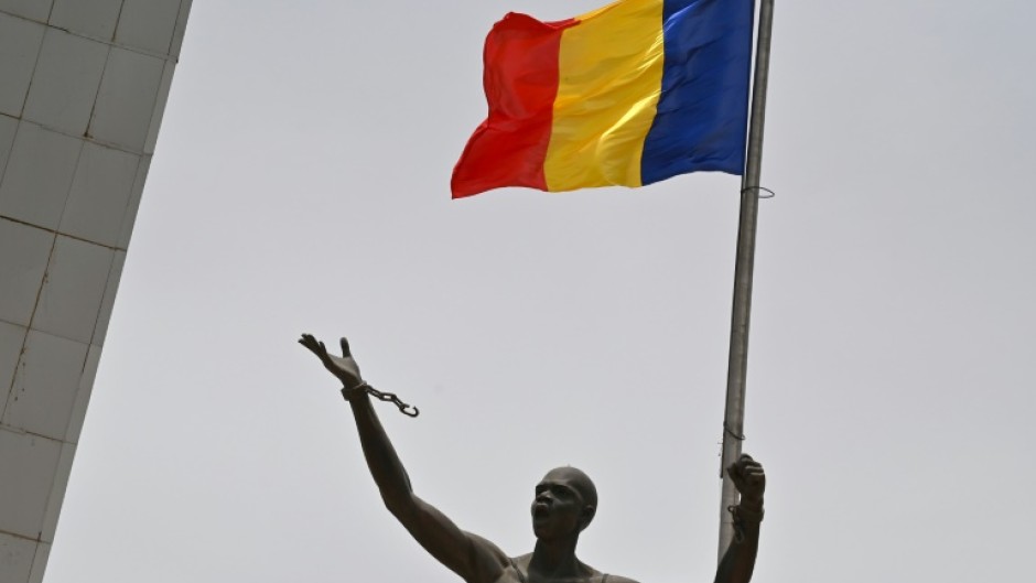In Chad's capital N'Djamena, the national flag flies on April 23, 2021, marking the state funeral for its late president Idriss Deby
