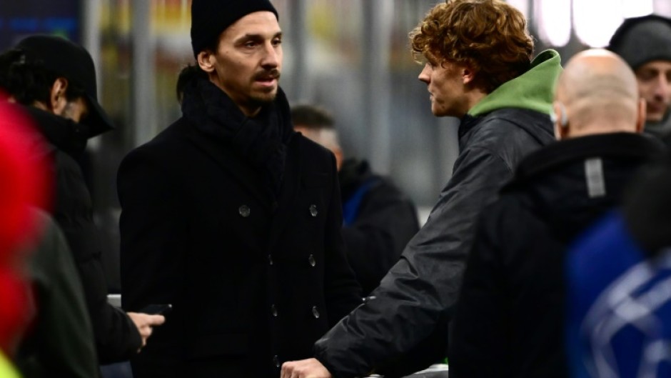 Zlatan Ibrahimovic speaks with Italian tennis star Jannik Sinner before Milan's recent defeat to Borussia Dortmund