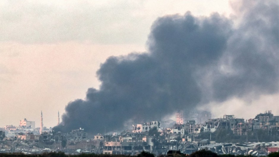 Smoke billows over the northern Gaza Strip during Israeli bombardment from southern Israel