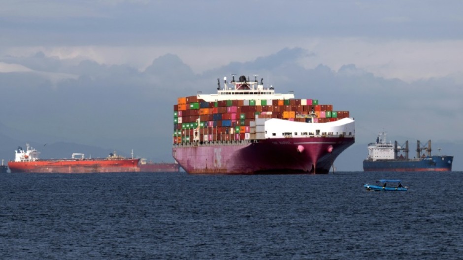 A container ship waits to enter the Panama Canal on September 24, 2023