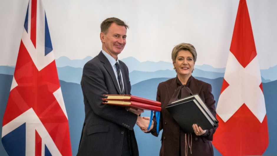 UK and Swiss finance ministers Jeremy Hunt  and Karin Keller-Sutter signed the deal in Bern