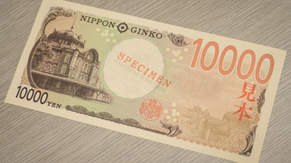 A strengthening Japanese yen helped push Tokyo stocks down at the open