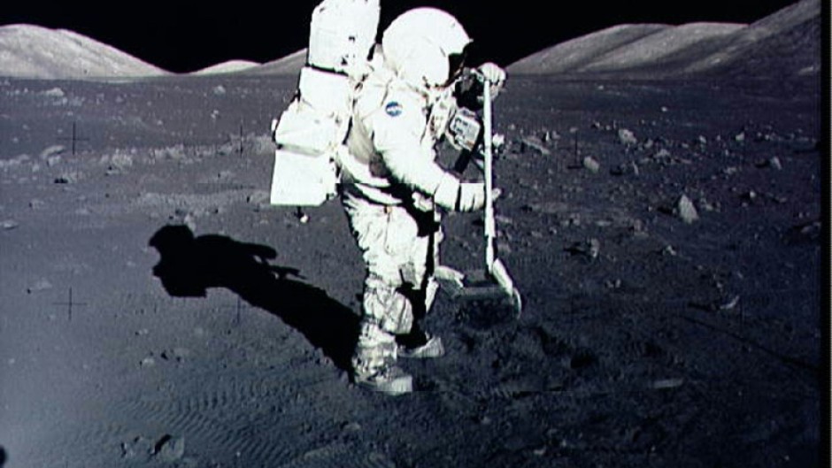 Astronaut Harrison Schmitt collects lunar rake samples at the Taurus-Littrow landing site on the moon during the Apollo 17 mission, America's last lunar landing