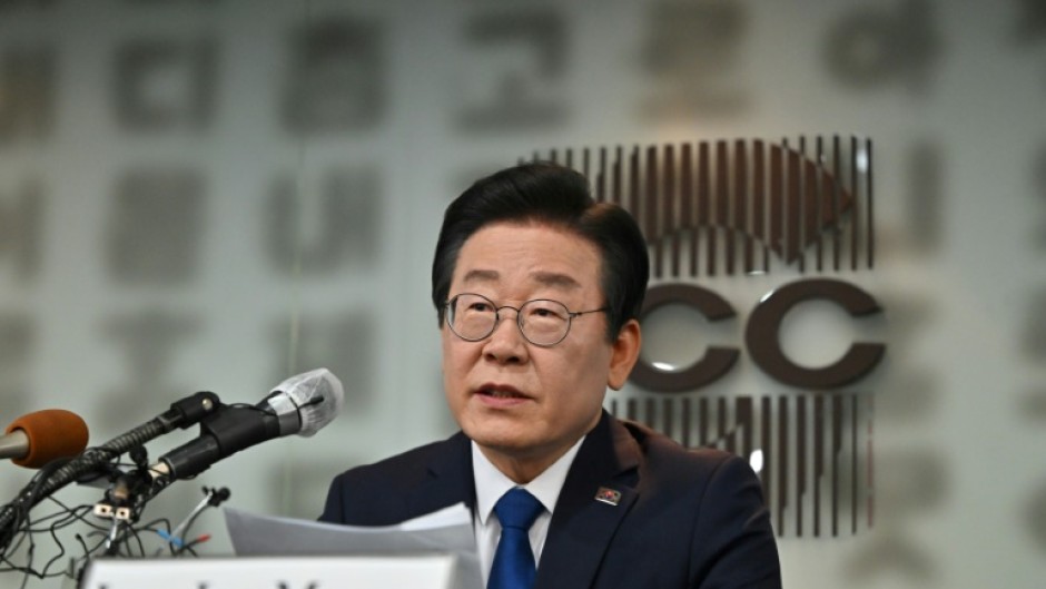 South Korean opposition leader Lee Jae-myung called for more peaceful politics after he was attacked by a knife-wielding man in Busan