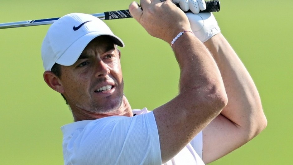 Rory McIlroy of Northern Ireland says PGA Tour titles are cheapened when many of the world's top players are banned after jumping to rival LIV Golf and merging the tours is more important than punishing defectors who seek a return
