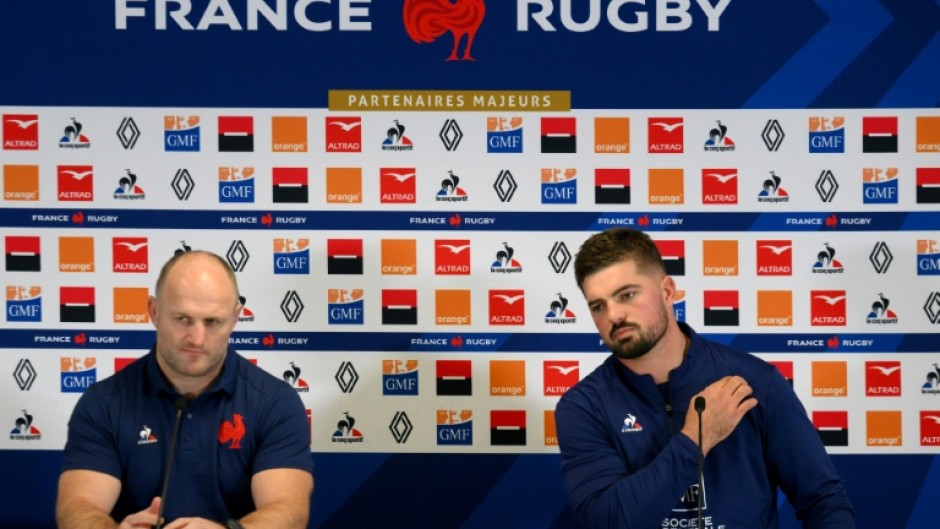 William Servat (L) and France captain Gregory Alldritt face the press after the defeat by Ireland
