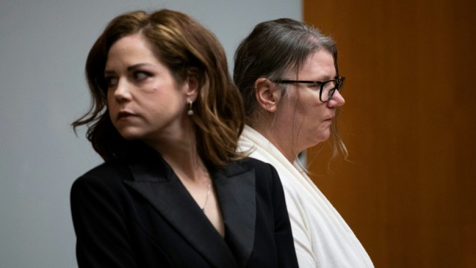 Jennifer Crumbley (R), the mother of Oxford High School shooter Ethan Crumbley, and her attorney Shannon Smith (L)
