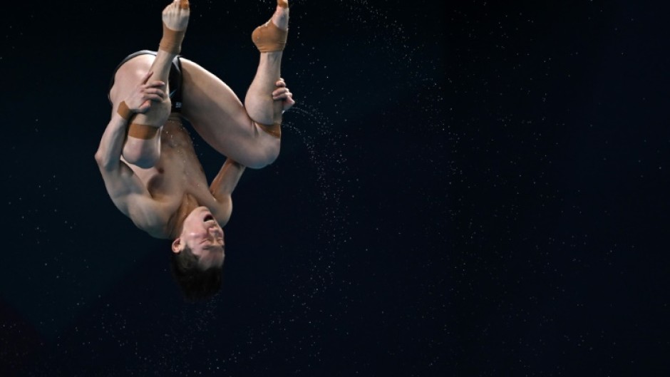 Wang Zongyuan made it three in a row in the men's 3m springboard 
