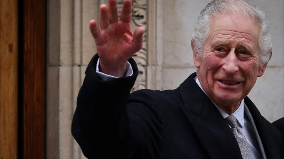 Britain's King Charles III waves as he leaves the London Clinic, in London, on January 29, 2024