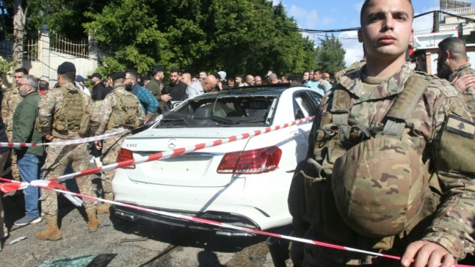 Lebanese soldiers secure the area after a reported Israeli drone strike in the village of Jadra