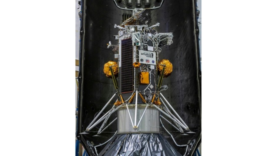 This handout picture from NASA shows the Nova-C lunar lander encapsulated within the fairing of a SpaceX Falcon 9 rocket in preparation for launch