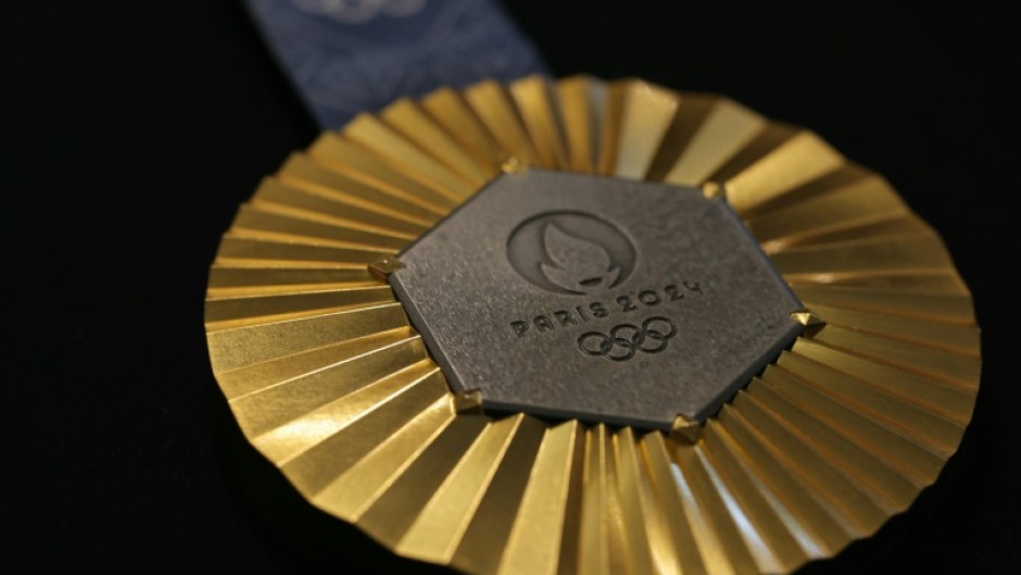 TThe medals for the 2024 Paris Olympics, designed by LVMH brand Chaumet, feature a piece of iron from the original Eiffel Tower in the centre