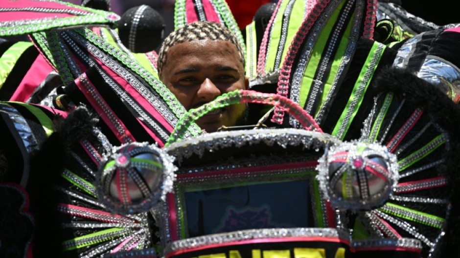 A reveler performs during the official Carnival opening ceremony in Rio de Janeiro on February 9, 2024