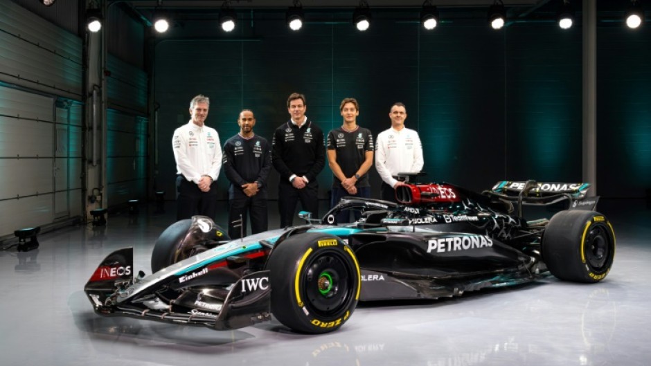 Lewis Hamilton (second from left) wants to get Mercedes 'back to where we once were' as he starts his final season with the team