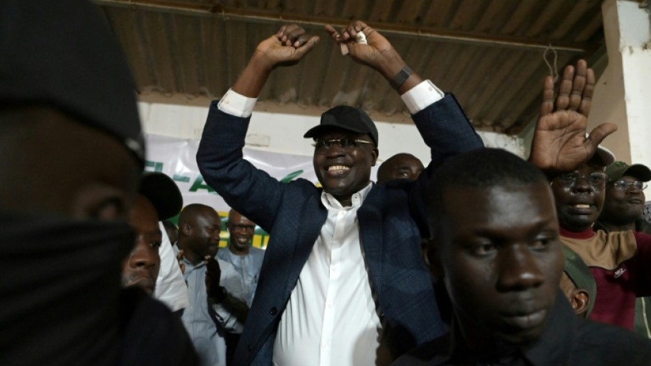 Sall talked to local residents and activists as he made his way through the stalls, workshops and houses