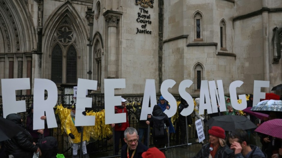 Supporters of Assange and Wikileaks demonstrated outside the London court Wednesday