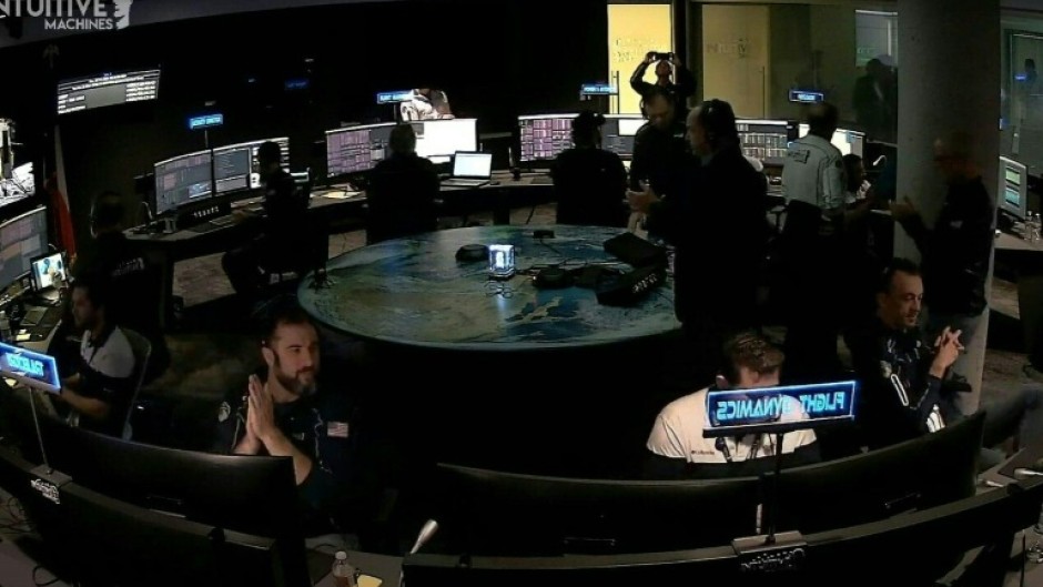 This frame grab from NASA shows the control room of Intuitive Machines as its Odysseus lunar lander touches down on the moon