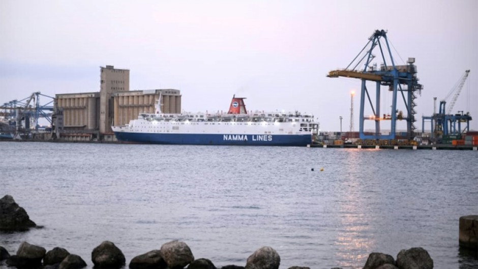 A Saudi-flagged ferry carrying war evacuees, at Port Sudan on April 25, 2023 -- international trade fell 23 percent in 2023, Sudan's port authorities said