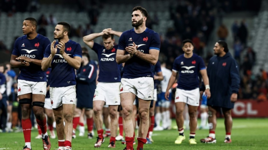 Charles Ollivon (C) after the draw to Italy