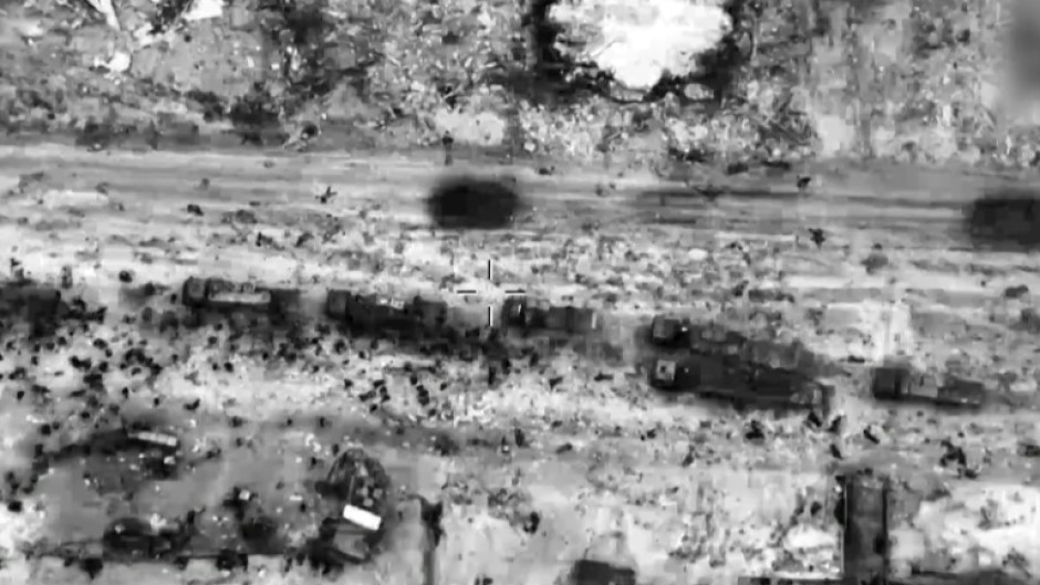 Another image grab from the video released by the Israeli army shows what the army says are Gazans mobbing aid trucks in Gaza City