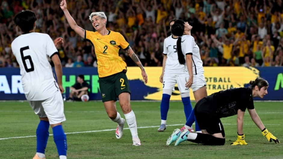 Michelle Heyman celebrates scoring a goal for Australia against Uzbekistan