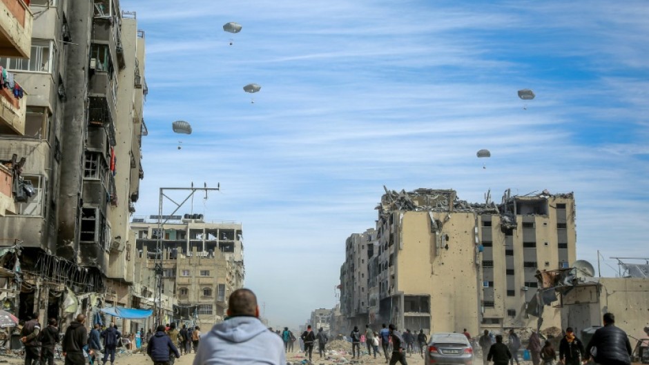 Foreign militaries have air dropped supplies over Gaza, sending a sea of humanitarian aid supplies floating down  