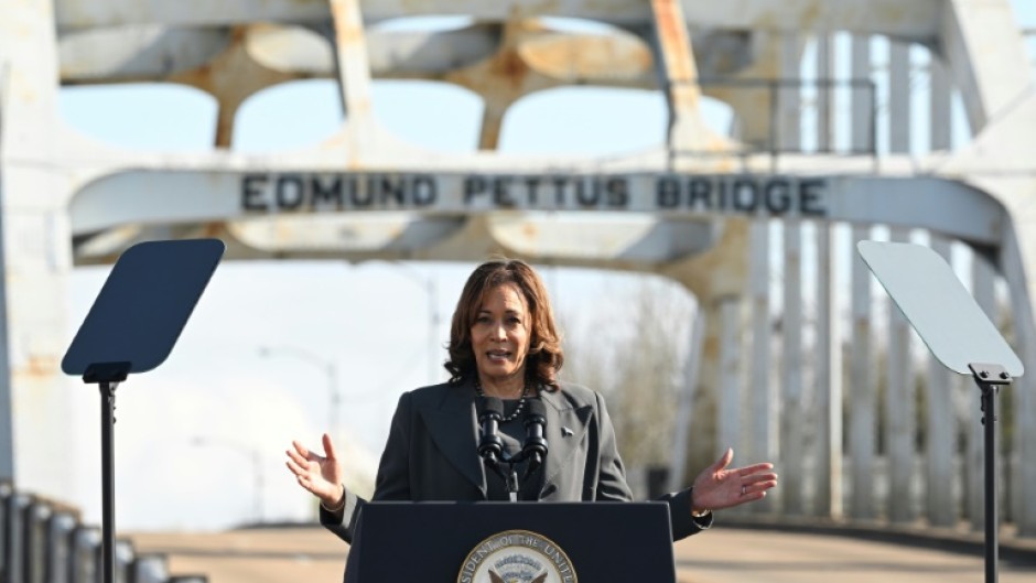 US Vice President Kamala Harris speaks at the Edmund Pettus Bridge during an event to commemorate the 59th anniversary of "Bloody Sunday" in Selma, Alabama