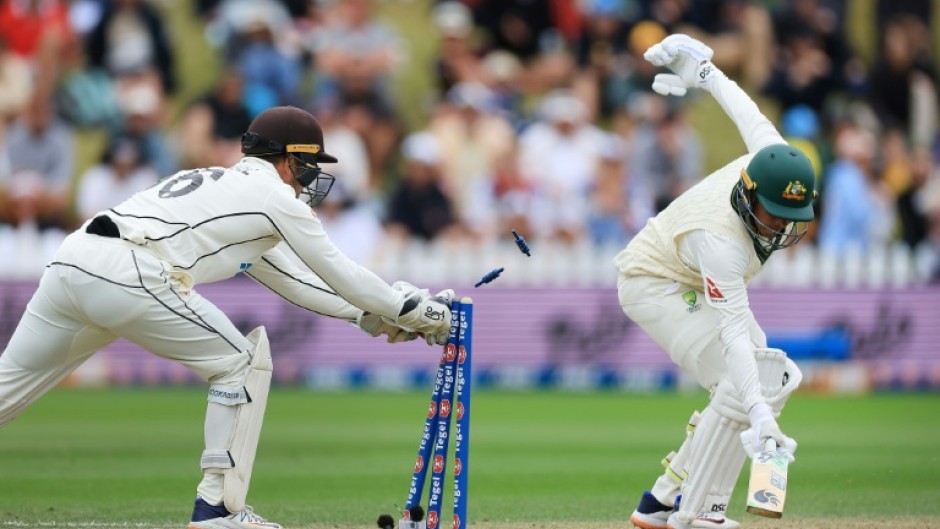 Australia's Usman Khawaja is stumped by New Zealand wicketkeeper Tom Blundell during day three of the first Test
