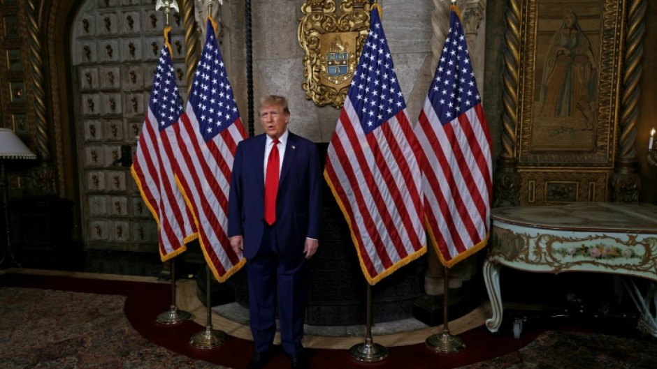 Former president Donald Trump speaks to reports from the library at his Mar-a-Lago resort on March 4, 2024 after the Supreme Court ruling