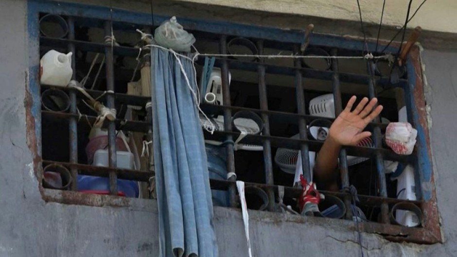 Few people remained in the biggest prison in Haiti's captial after attack by gang members allowed thousands to escape