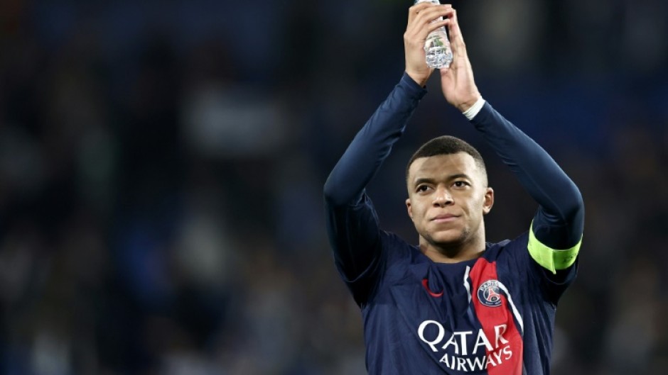 Kylian Mbappe insisted he had 'no problem' with coach Luis Enrique after firing PSG into the Champions League quarter-finals