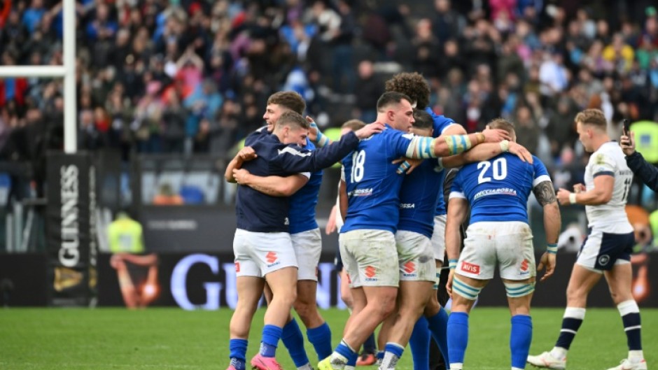 Italy celebrate after beating Scotland in the Six Nations in Rome