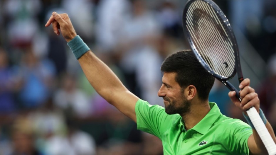 Top-ranked Novak Djokovic of Serbia celebrates a victory over Aleksandar Vukic of Australia at Indian Wells